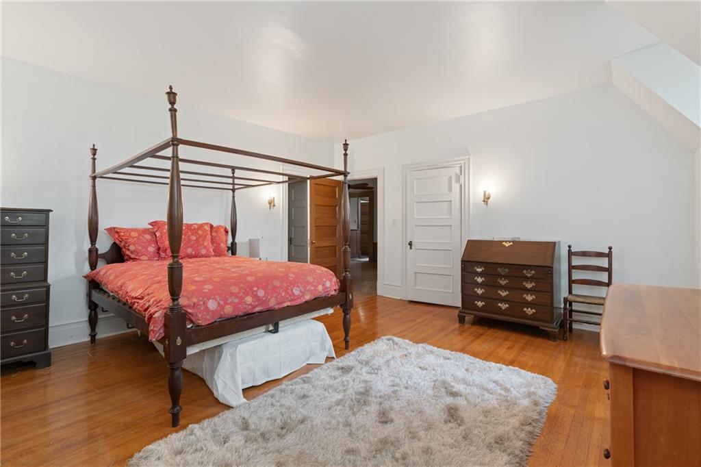 5238 Ellsworth Avenue Pittsburgh, PA 15232 - Photo 19 of 47 a bedroom with a bed and a closet