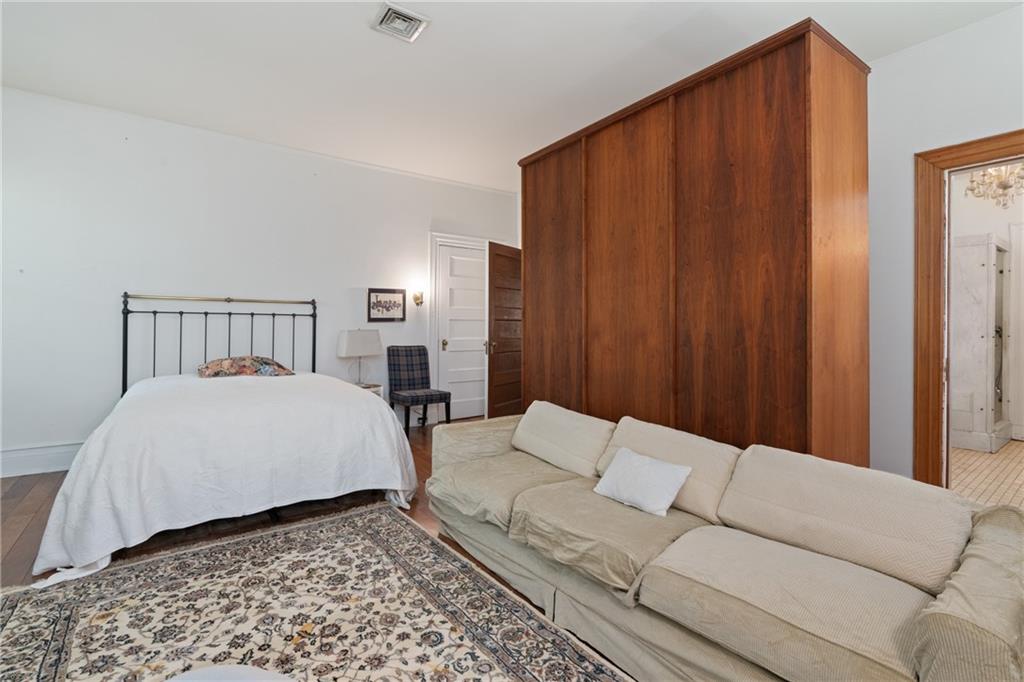 5238 Ellsworth Avenue Pittsburgh, PA 15232 - Photo 21 of 47 a bedroom with a bed and a window