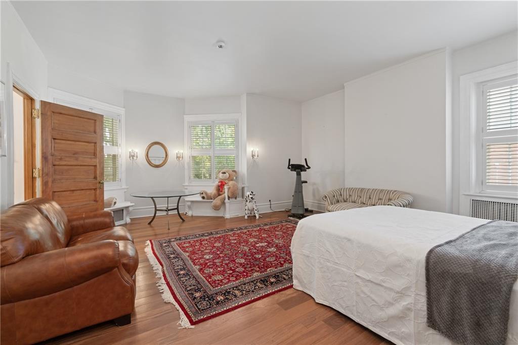 5238 Ellsworth Avenue Pittsburgh, PA 15232 - Photo 22 of 47 a living room with furniture rug and window