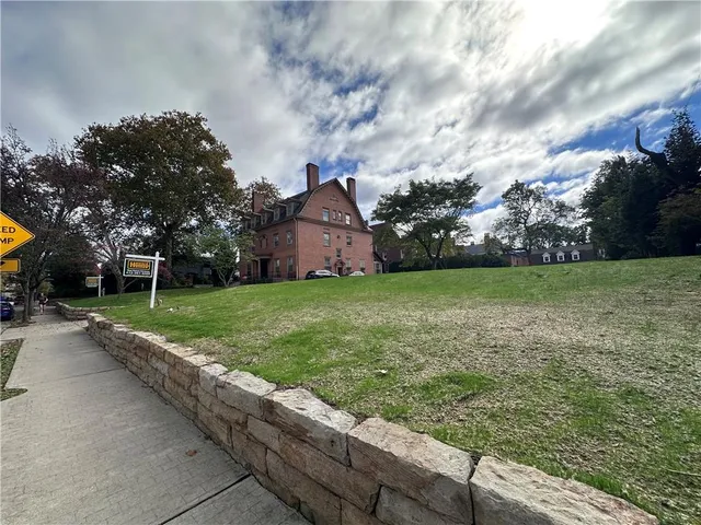 a view of a hallway view with staircase