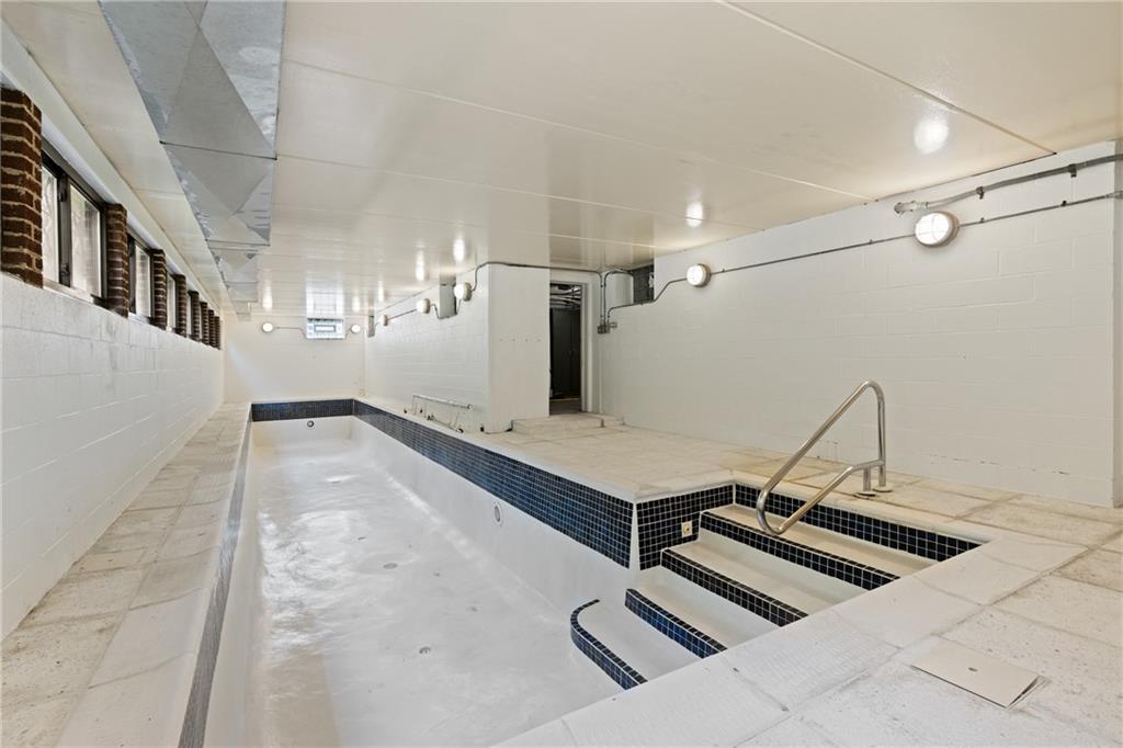 5238 Ellsworth Avenue Pittsburgh, PA 15232 - Photo 32 of 47 a view of a livingroom with a flat screen tv