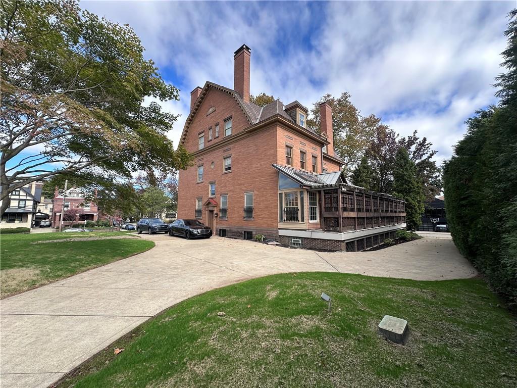 5238 Ellsworth Avenue Pittsburgh, PA 15232 - Photo 39 of 47 a front view of a house with a garden