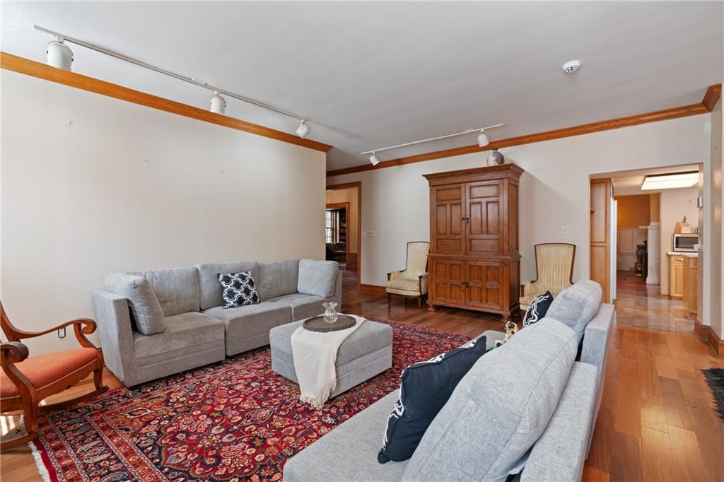 5238 Ellsworth Avenue Pittsburgh, PA 15232 - Photo 9 of 47 a living room with furniture and wooden floor
