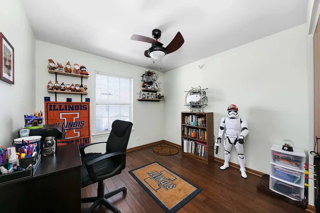 a workspace with furniture and wooden floor