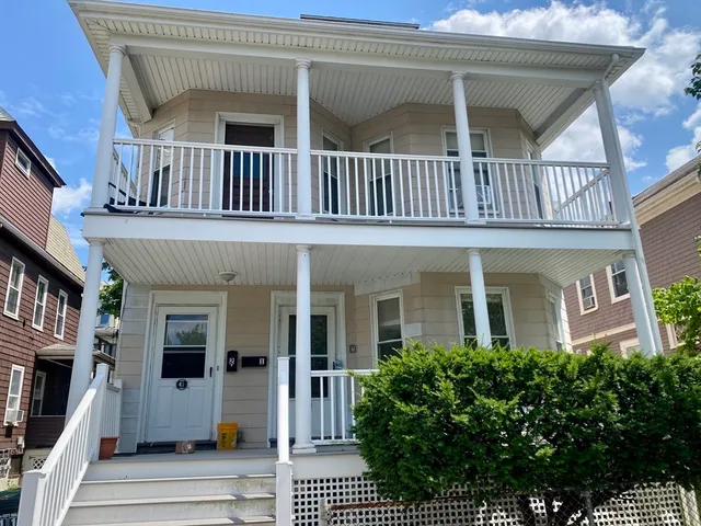 a view of an house with balcony
