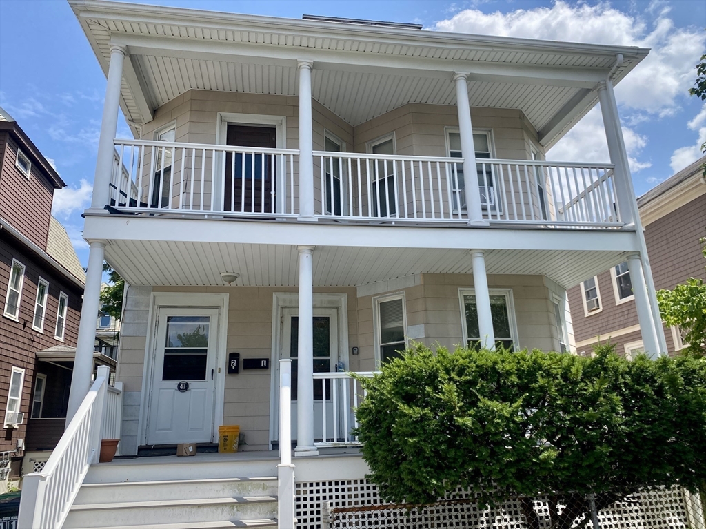 39-41 Michigan Avenue, Unit 1 Somerville, MA 02145 - Photo 26 of 27 a view of an house with balcony
