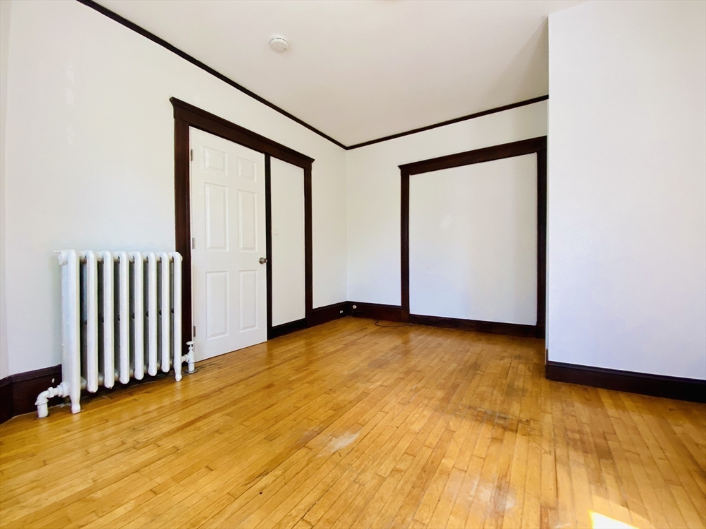 39-41 Michigan Avenue, Unit 1 Somerville, MA 02145 - Photo 6 of 27 an empty room with windows
