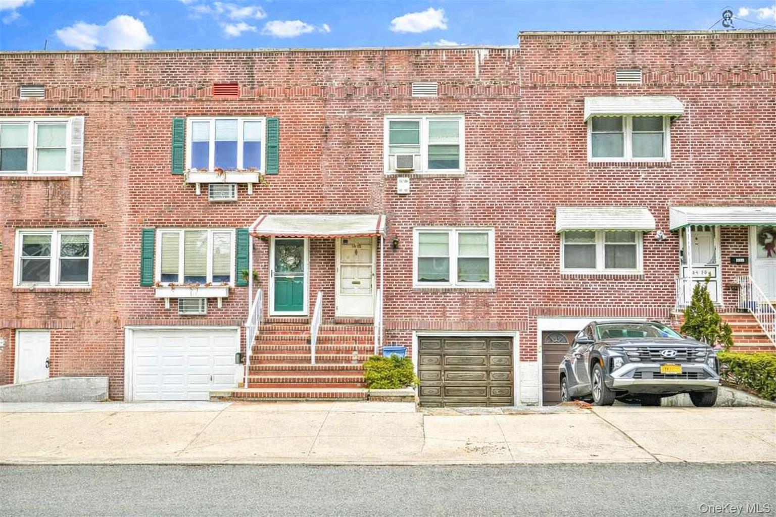 84-92 Austin Street Queens, NY 11415 - Photo 1 of 40 a front view of a house