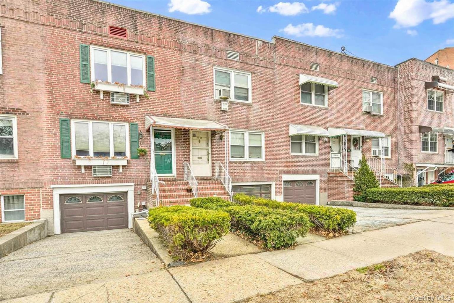 84-92 Austin Street Queens, NY 11415 - Photo 2 of 40 a front view of a building
