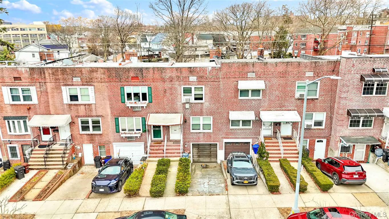 84-92 Austin Street Queens, NY 11415 - Photo 31 of 40 a view of a building with many windows