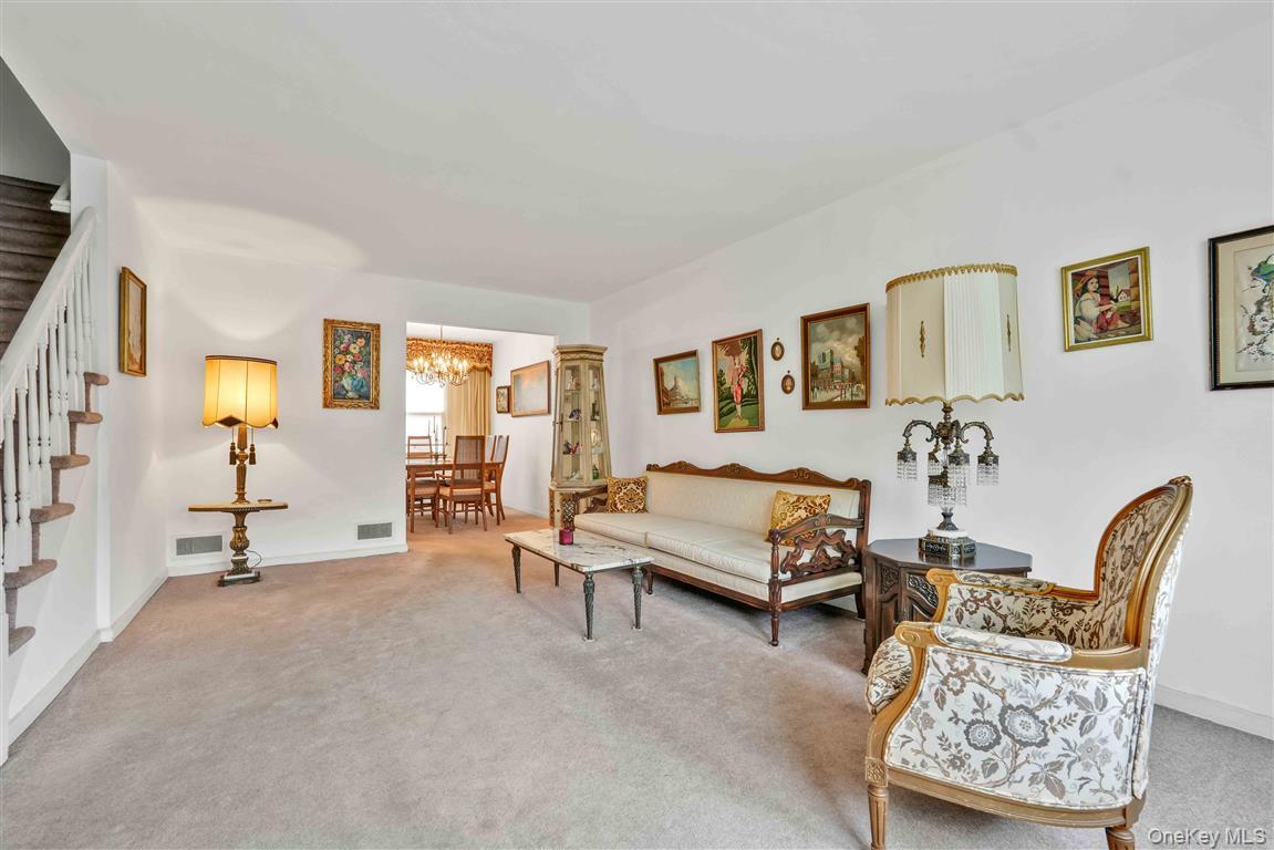 84-92 Austin Street Queens, NY 11415 - Photo 4 of 40 a bedroom with furniture and a window