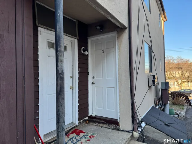 a view of front door and porch