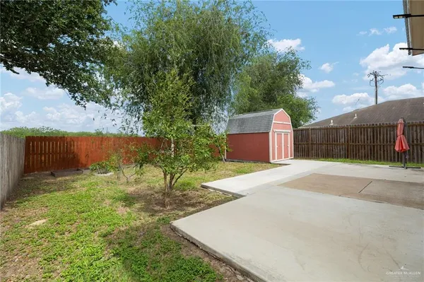 a fire hydrant in the middle of a yard