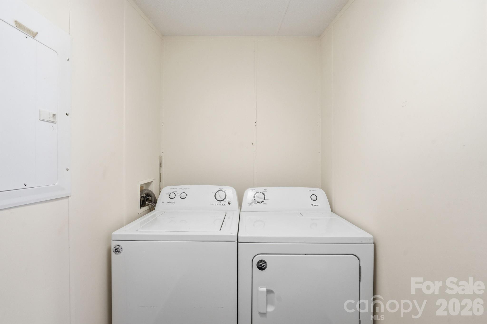 2862 Eagle Point Drive Trinity, NC 27370 - Photo 23 of 31 a utility room with dryer and washer