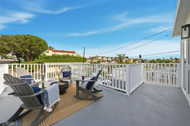a view of balcony with furniture
