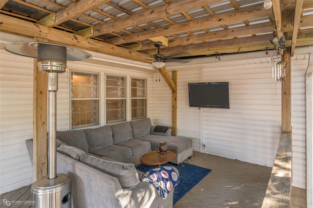 803 Drew Lane Minden, LA 71055 - Photo 32 of 33 a outdoor living space with furniture and a potted plant