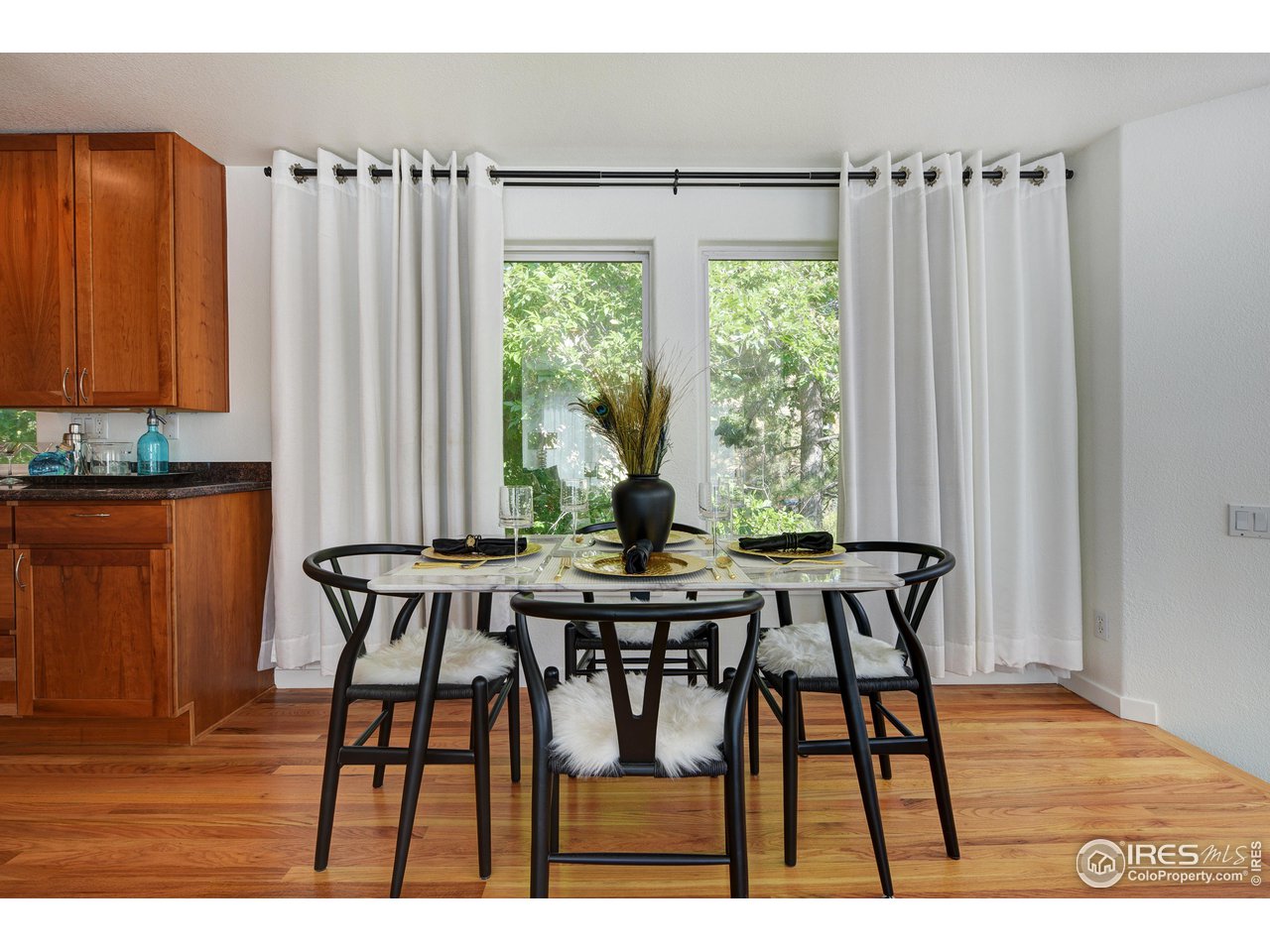 2701 Mapleton Avenue, Unit C Boulder, CO 80304 - Photo 14 of 34 a view of a dining room with furniture and window