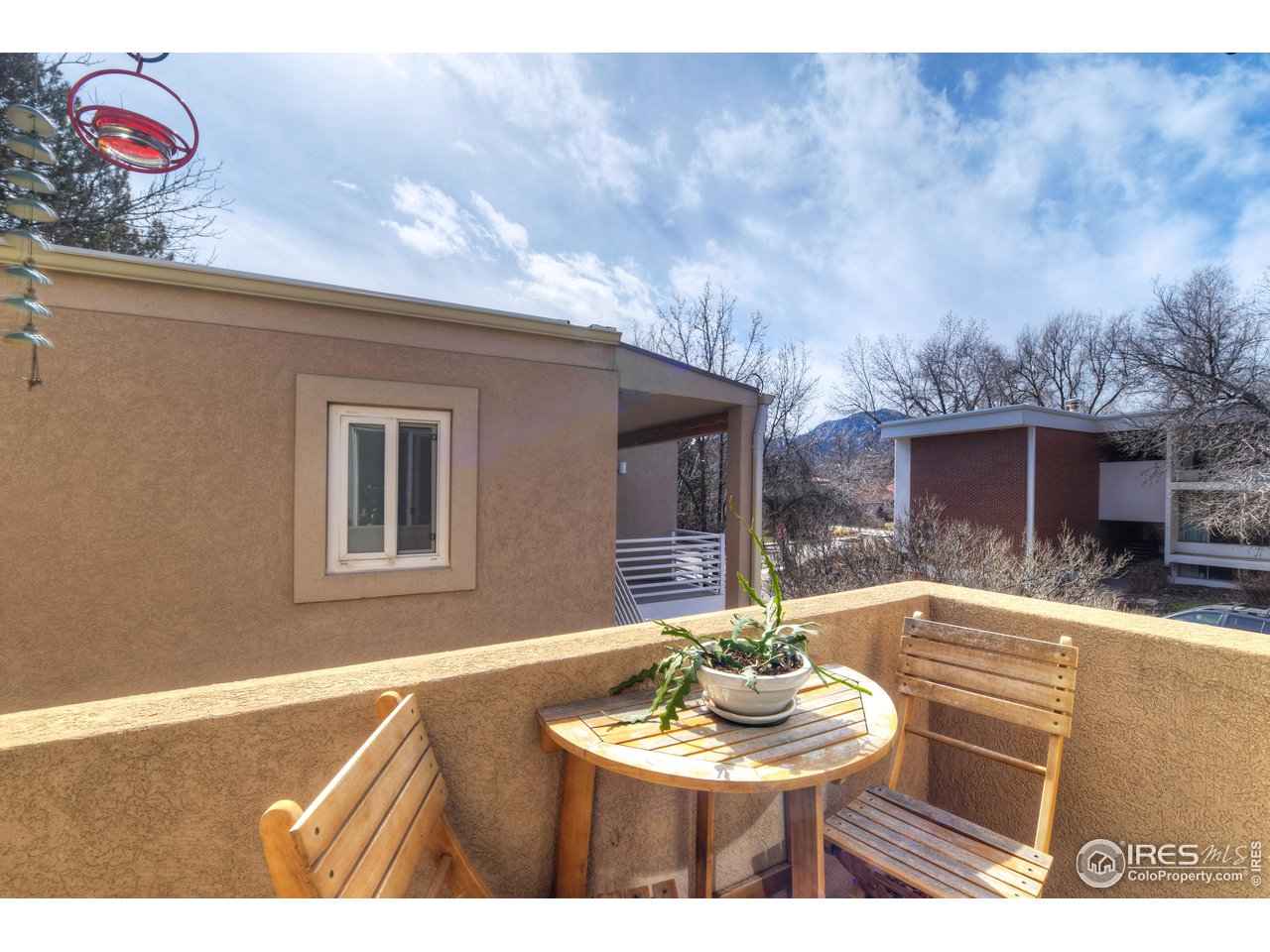 2701 Mapleton Avenue, Unit C Boulder, CO 80304 - Photo 15 of 34 a view of a livingroom with furniture and window