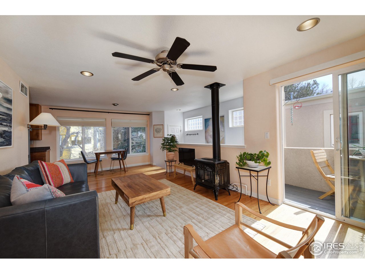 2701 Mapleton Avenue, Unit C Boulder, CO 80304 - Photo 2 of 34 a living room with furniture and a large window