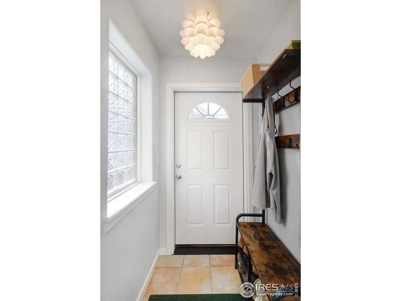 2701 Mapleton Avenue, Unit C Boulder, CO 80304 - Photo 25 of 34 a view of hallway with a large window and chandelier