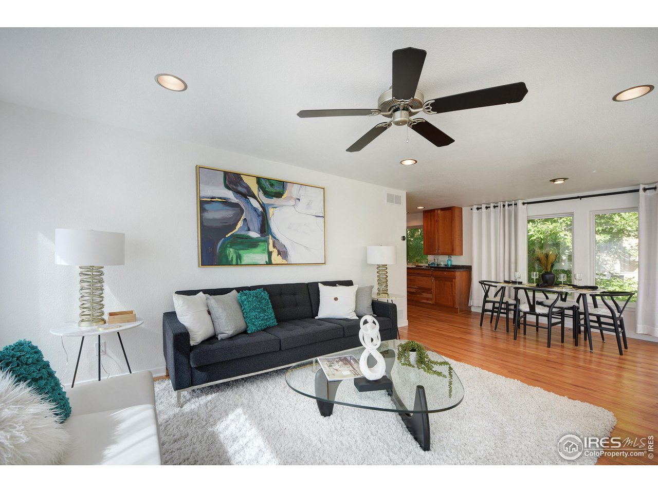 2701 Mapleton Avenue, Unit C Boulder, CO 80304 - Photo 3 of 34 a living room with furniture and a window
