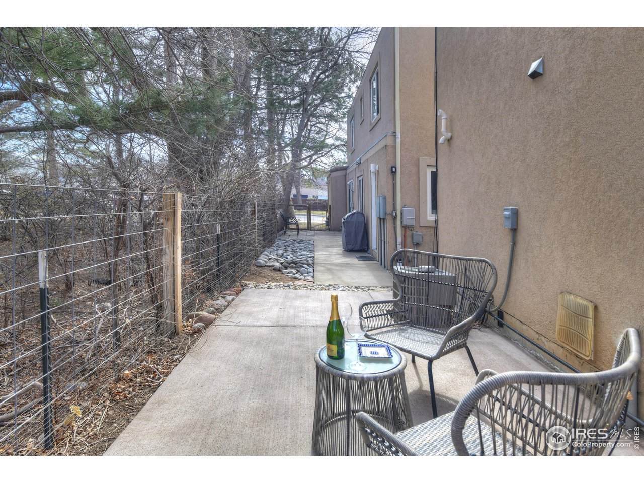 2701 Mapleton Avenue, Unit C Boulder, CO 80304 - Photo 31 of 34 a view of a chairs and tables in the patio