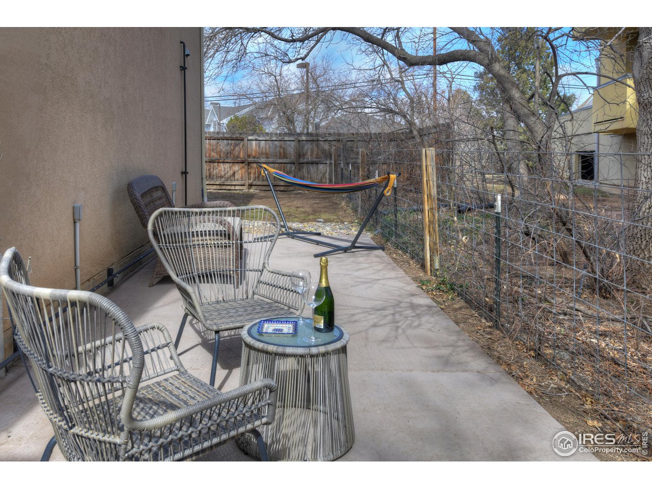 2701 Mapleton Avenue, Unit C Boulder, CO 80304 - Photo 32 of 34 a view of a chairs and table in backyard