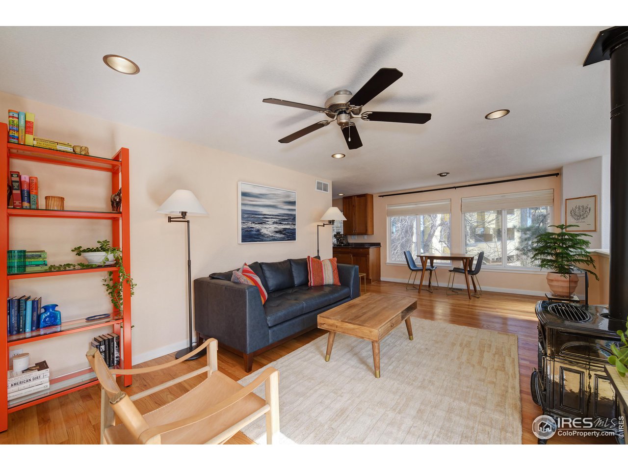 2701 Mapleton Avenue, Unit C Boulder, CO 80304 - Photo 7 of 34 a living room with furniture and a large window