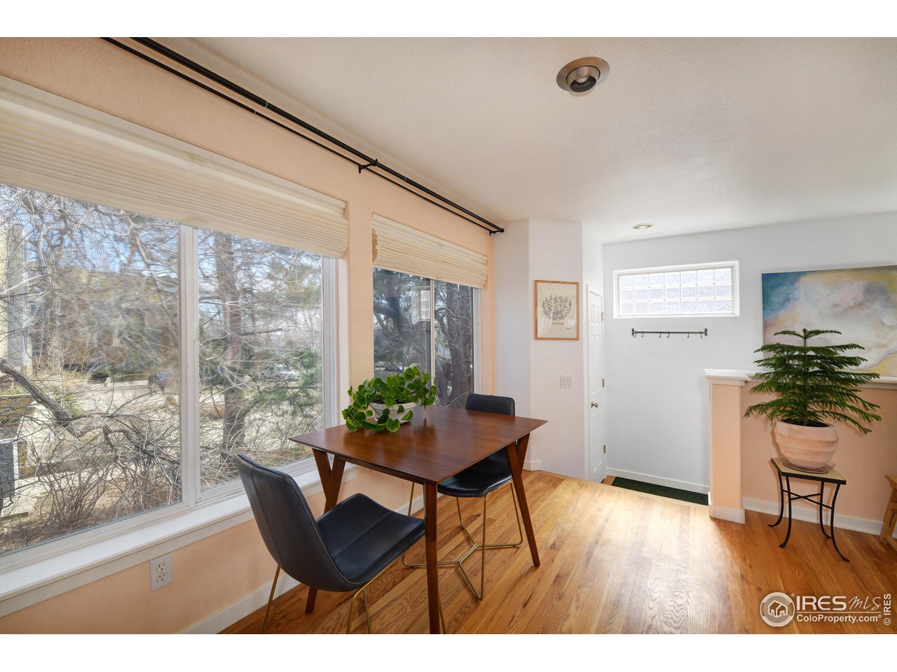 2701 Mapleton Avenue, Unit C Boulder, CO 80304 - Photo 9 of 34 a living room with furniture and a large window