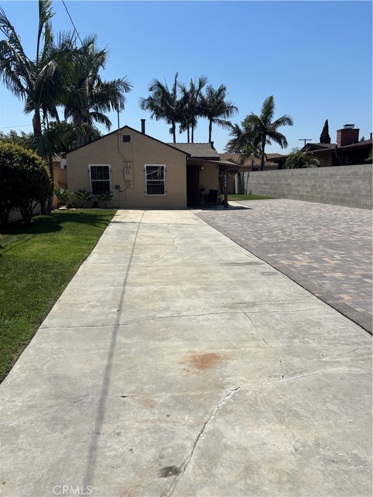 8808 Paseo Street Paramount, CA 90723 - Photo 14 of 15 a view of a backyard