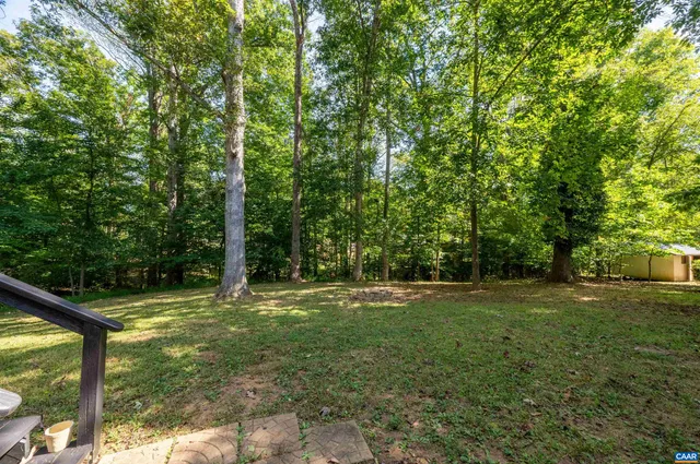 a house view with a garden space