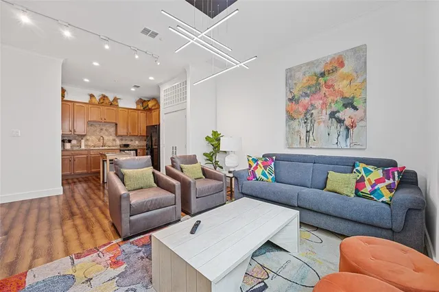 a living room with furniture and a couch