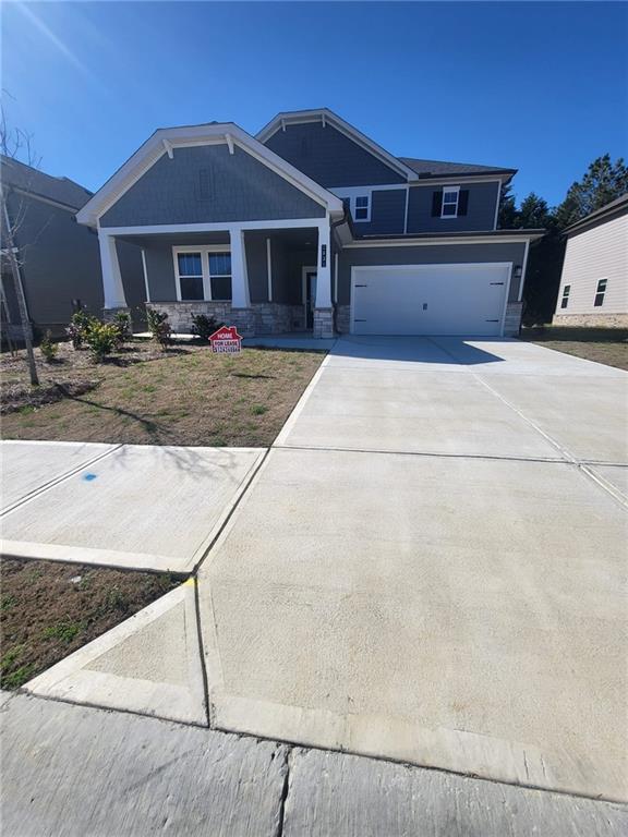 a front view of a house with yard
