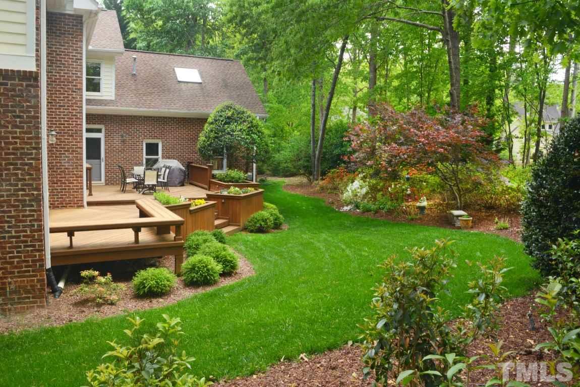 8808 Ross Court Raleigh, NC 27613 - Photo 17 of 25 a front view of a house with garden