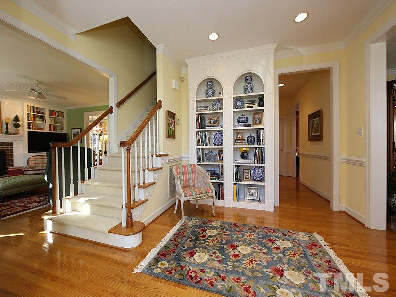 8808 Ross Court Raleigh, NC 27613 - Photo 19 of 25 a view of an entryway with wooden floor and a rug