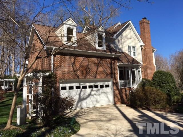 8808 Ross Court Raleigh, NC 27613 - Photo 22 of 25 a view of a house with a yard