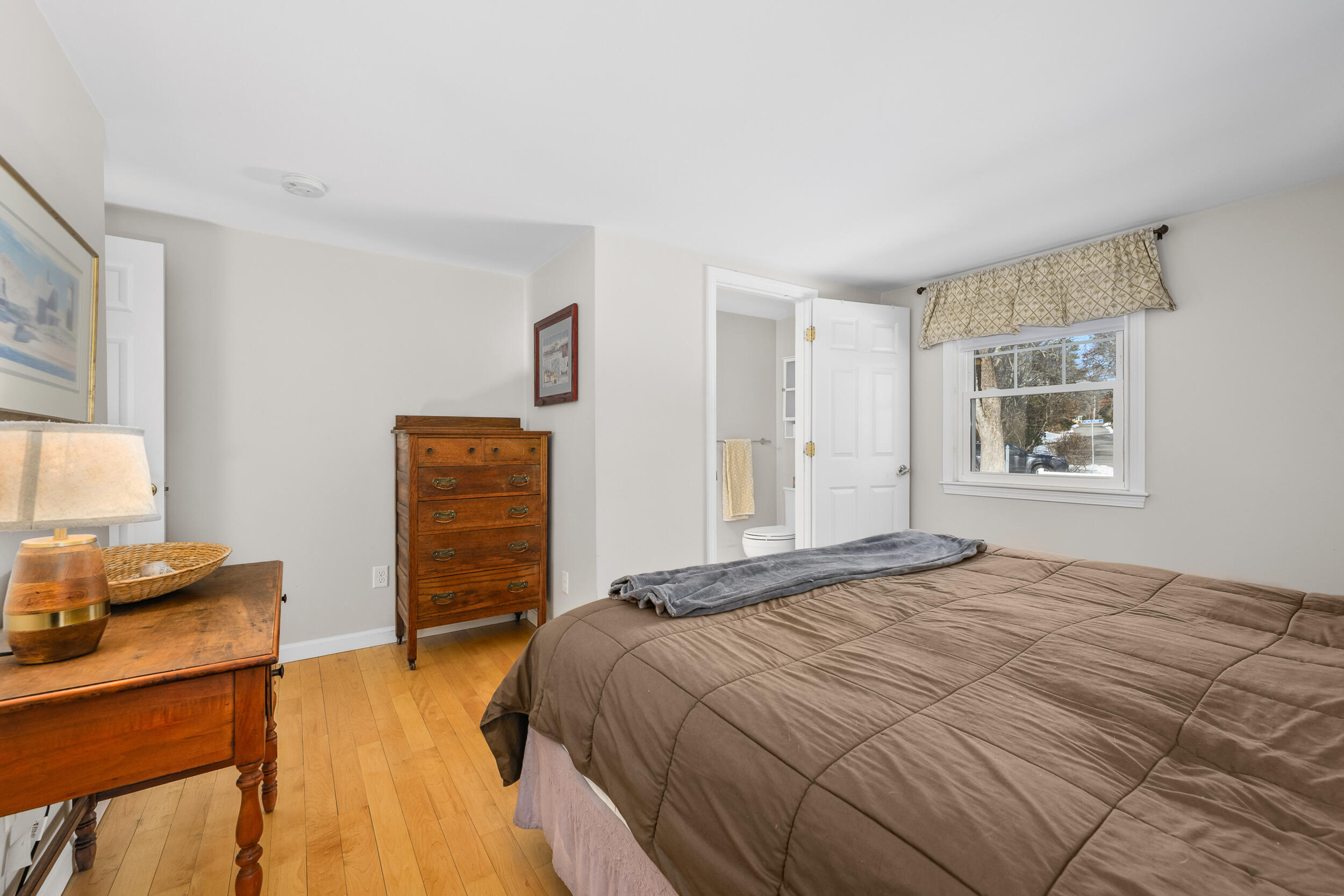 5 Chickadee Lane Centerville, MA 02632 - Photo 20 of 22 a bedroom with a bed and furniture