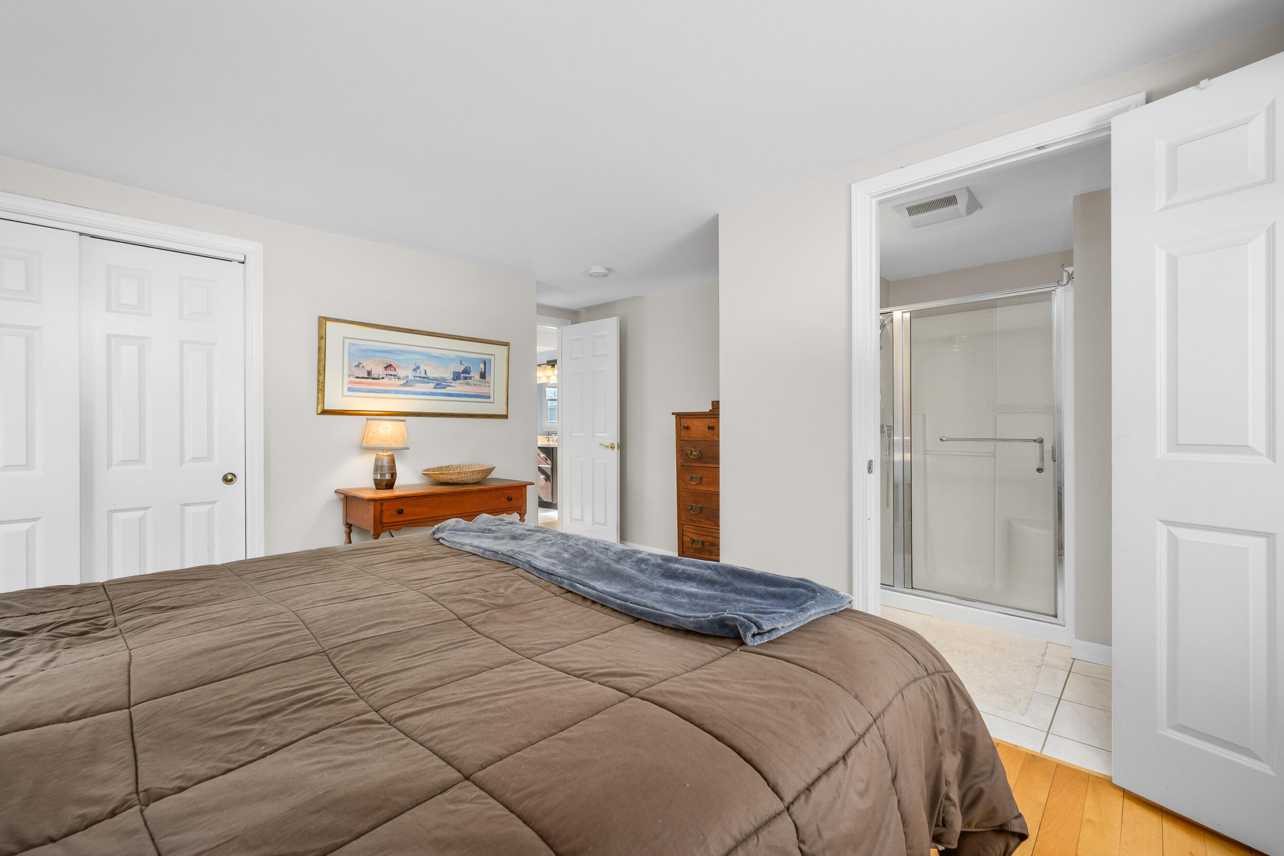 5 Chickadee Lane Centerville, MA 02632 - Photo 21 of 22 a bedroom with a bed and a window