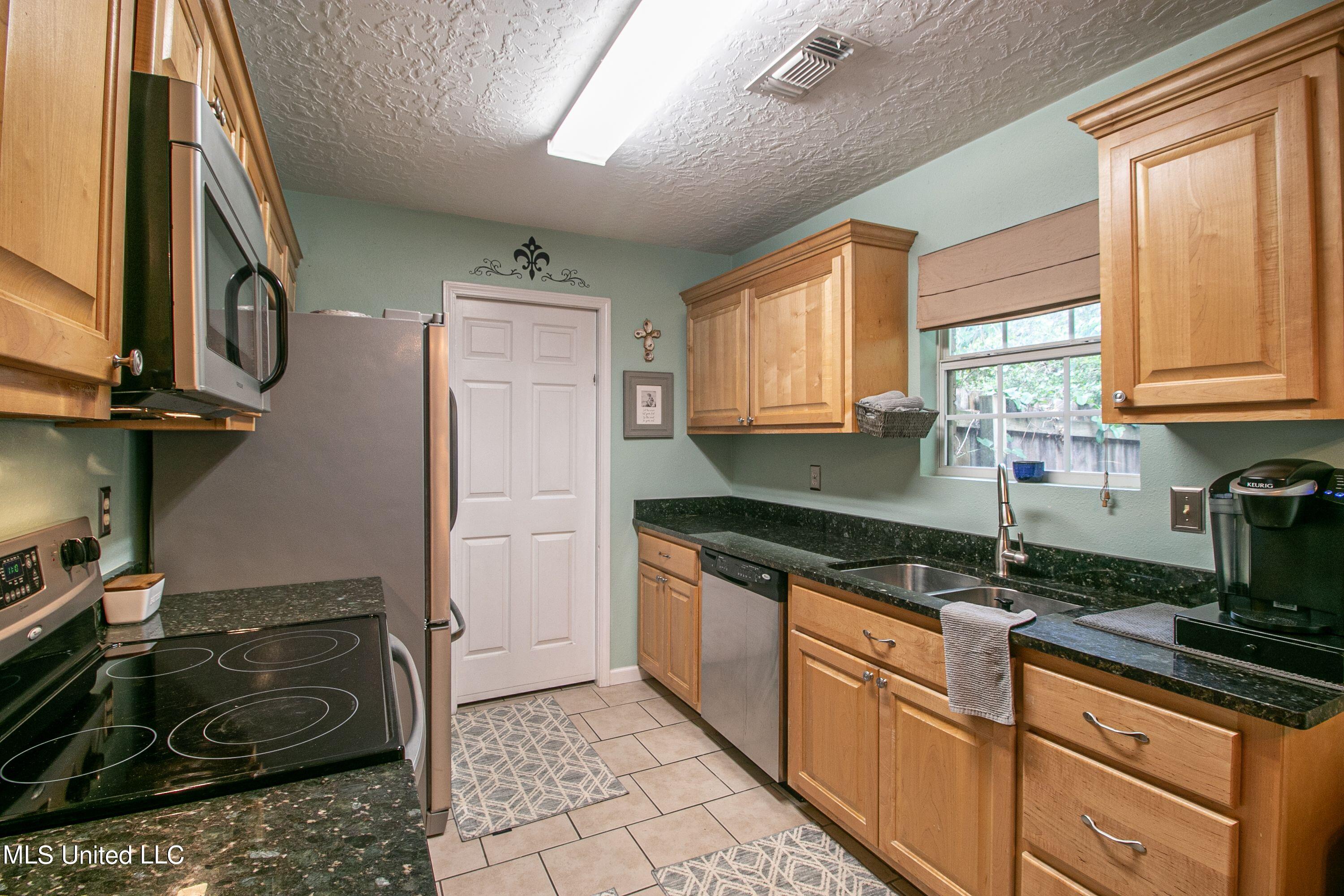 7756 Joe Fountain Road Ocean Springs, MS 39564 - Photo 8 of 24 Kitchen - 2 - Joe