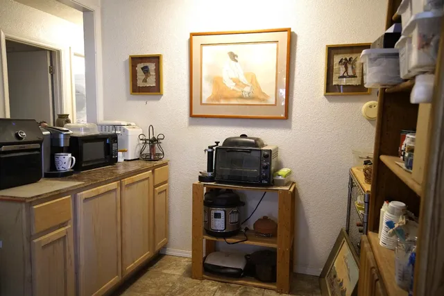a view of a livingroom with furniture and window