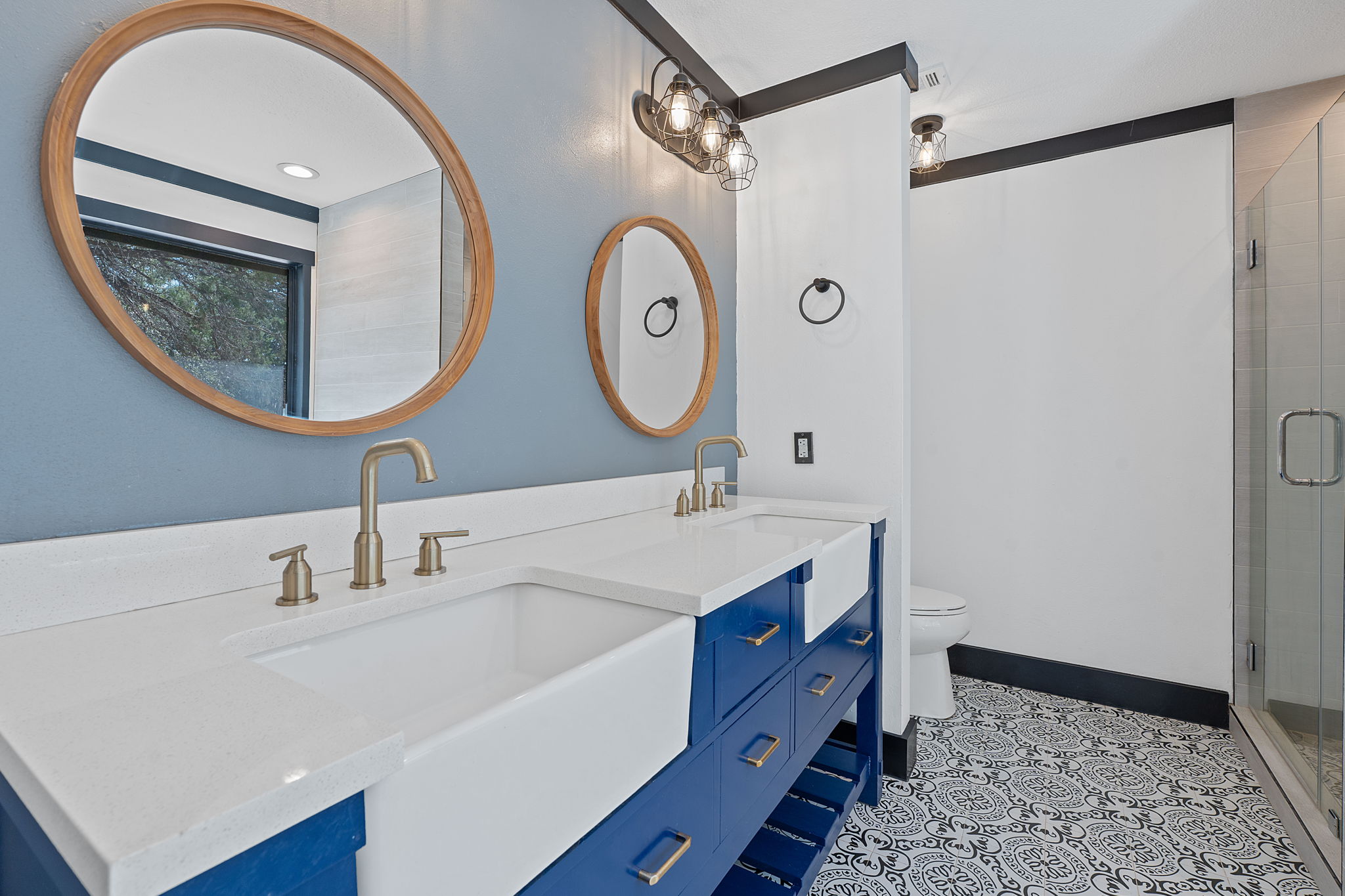 404 County Road 421 Spicewood, TX 78669 - Photo 20 of 31 a bathroom with a sink and a mirror
