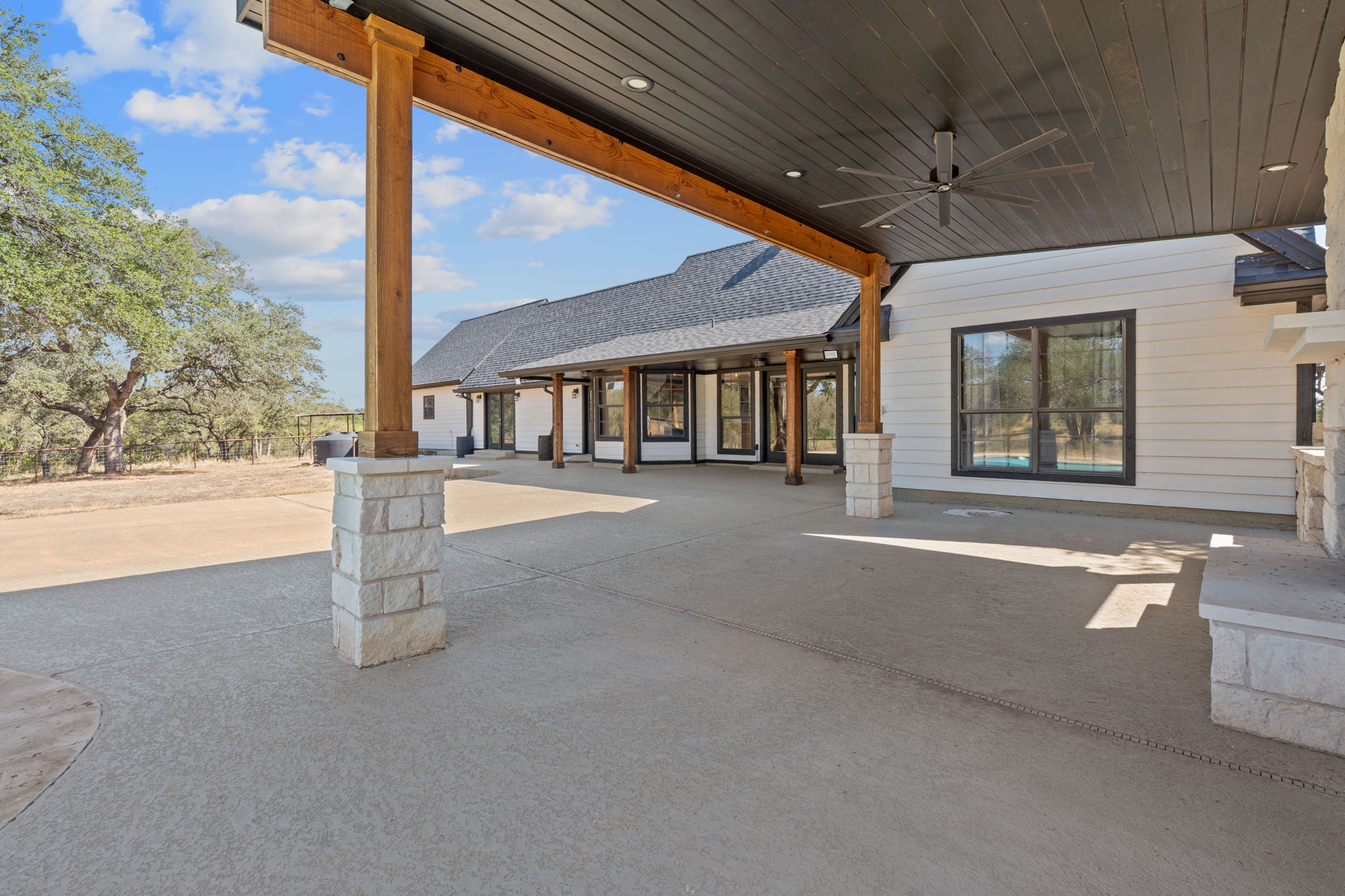 404 County Road 421 Spicewood, TX 78669 - Photo 26 of 31 a outdoor space with lots of windows