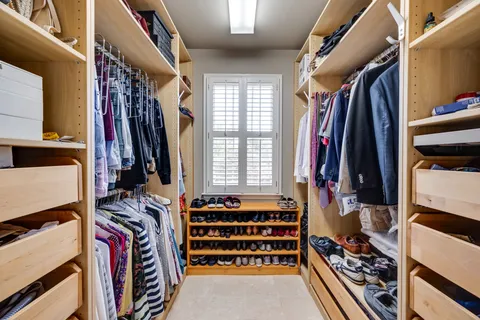 a front view of a building with a yard