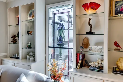 a kitchen with stainless steel appliances a sink counter space and a window