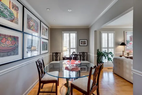a kitchen with a sink a stove and cabinets