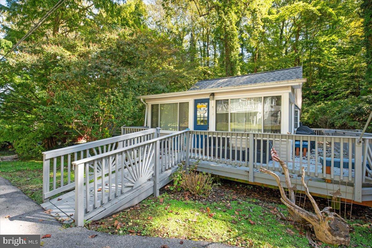 3330 1st Street Port Republic, MD 20676 - Photo 2 of 20 a view of a deck with a fence