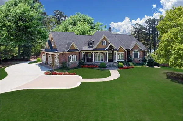 front view of a house with a yard