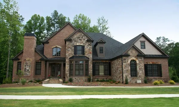 front view of a house with a yard