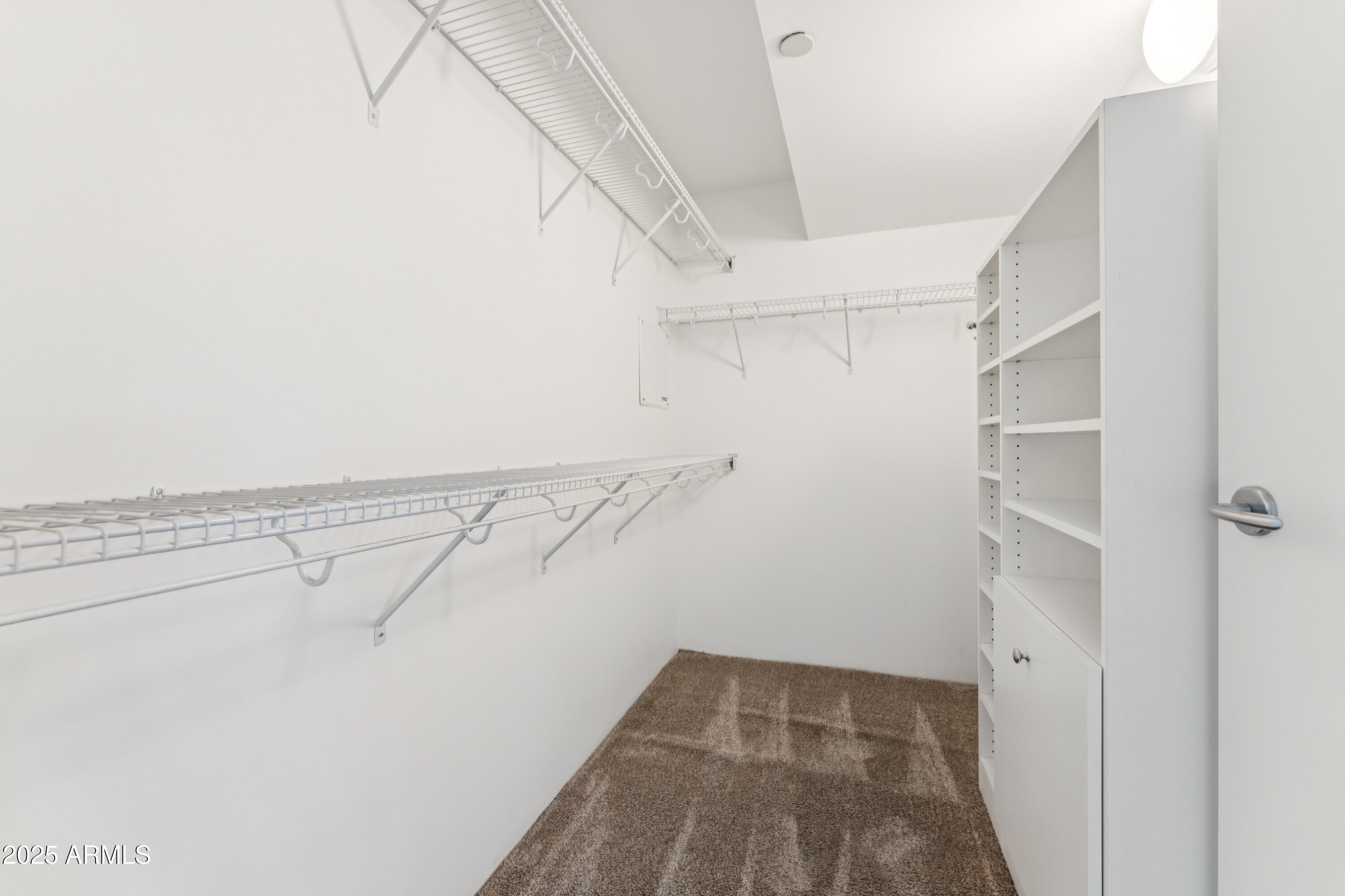 4808 North 24th Street, Unit 724 Phoenix, AZ 85016 - Photo 11 of 23 Primary walk-in closet