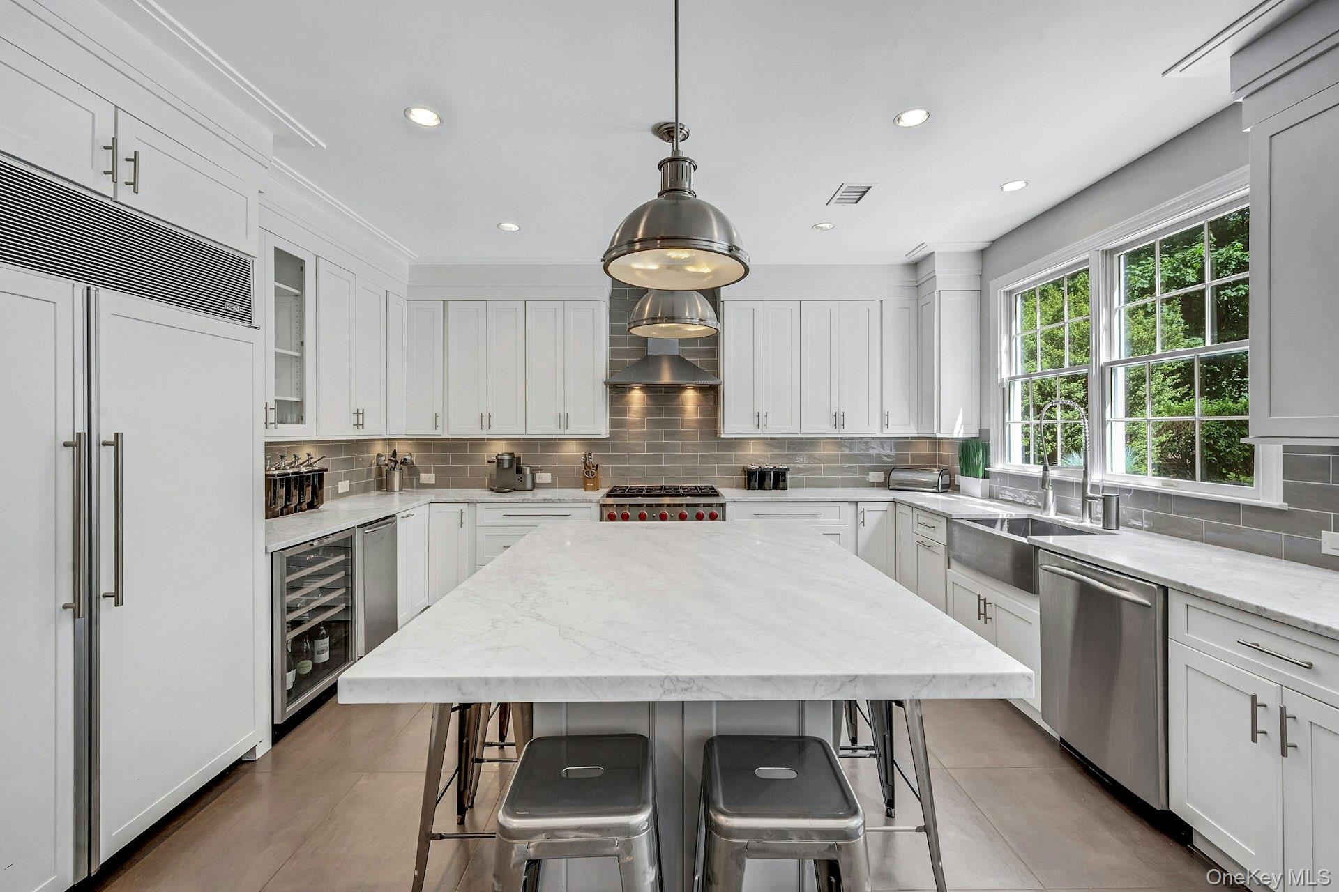 134 Euclid Avenue Ardsley, NY 10502 - Photo 13 of 48 Kitchen with stainless steel appliances, breakfast area, center island.